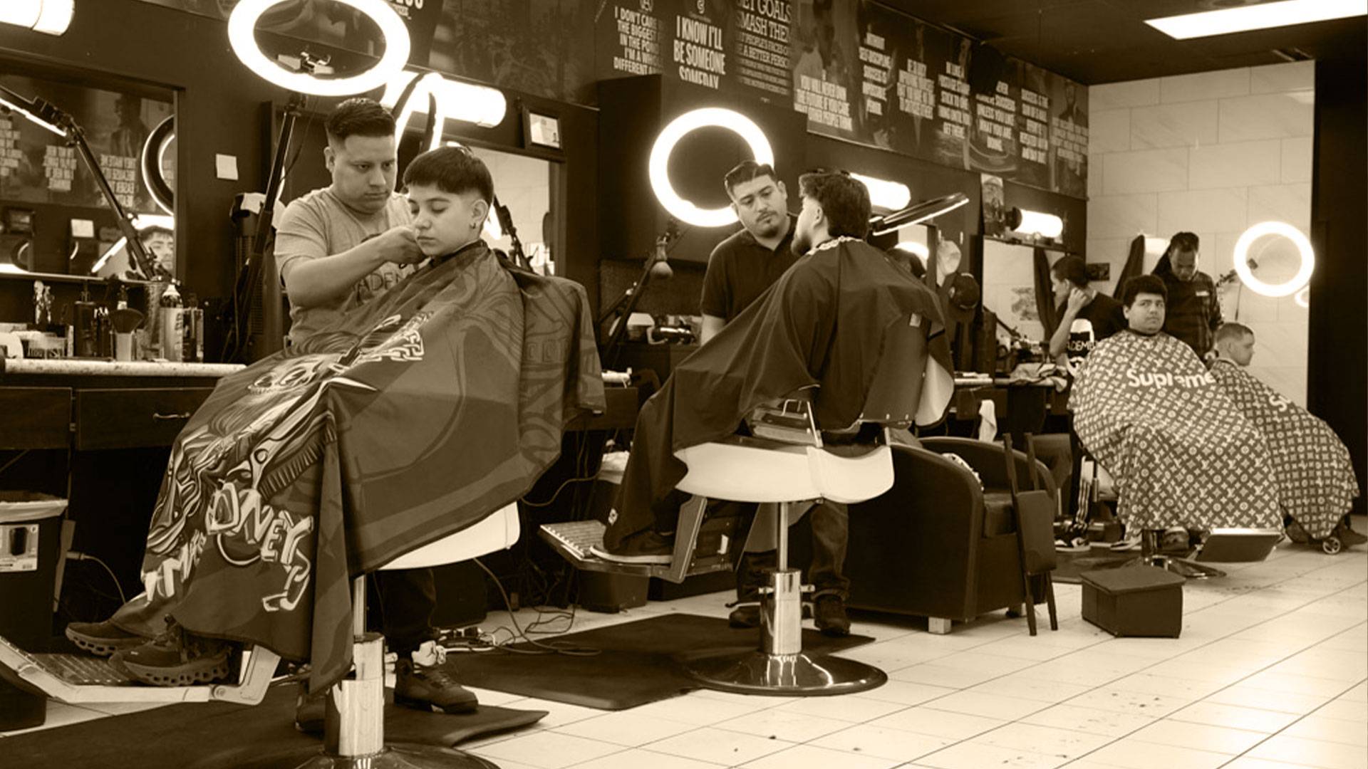 Made Men Studio barbers giving men haircuts