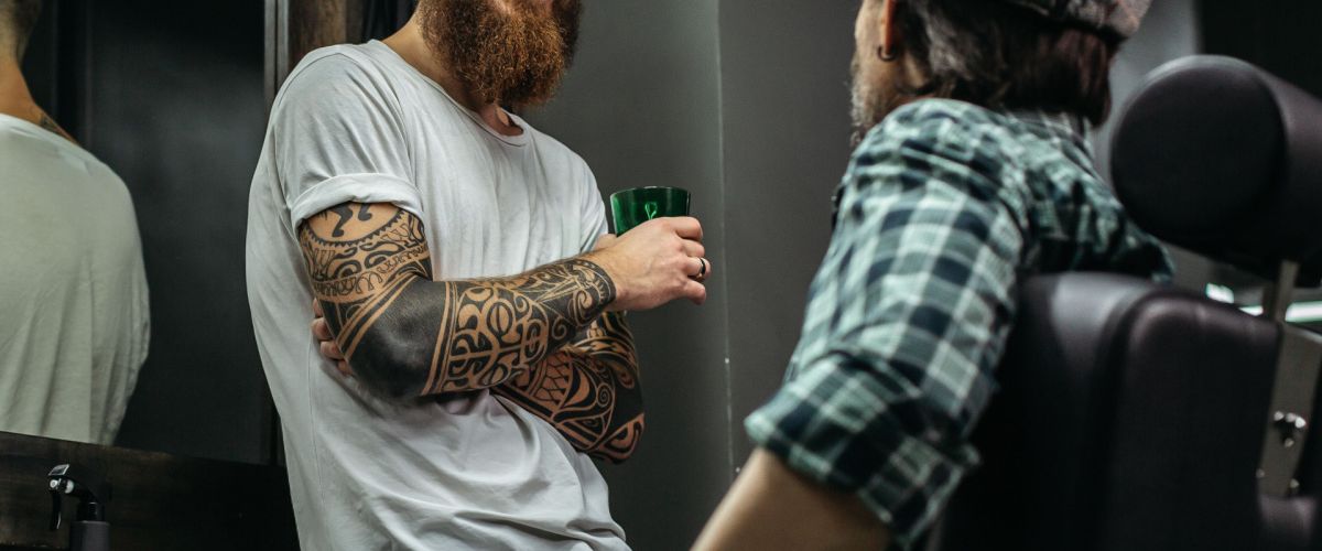 Houston barber speaks with client about his haircut.