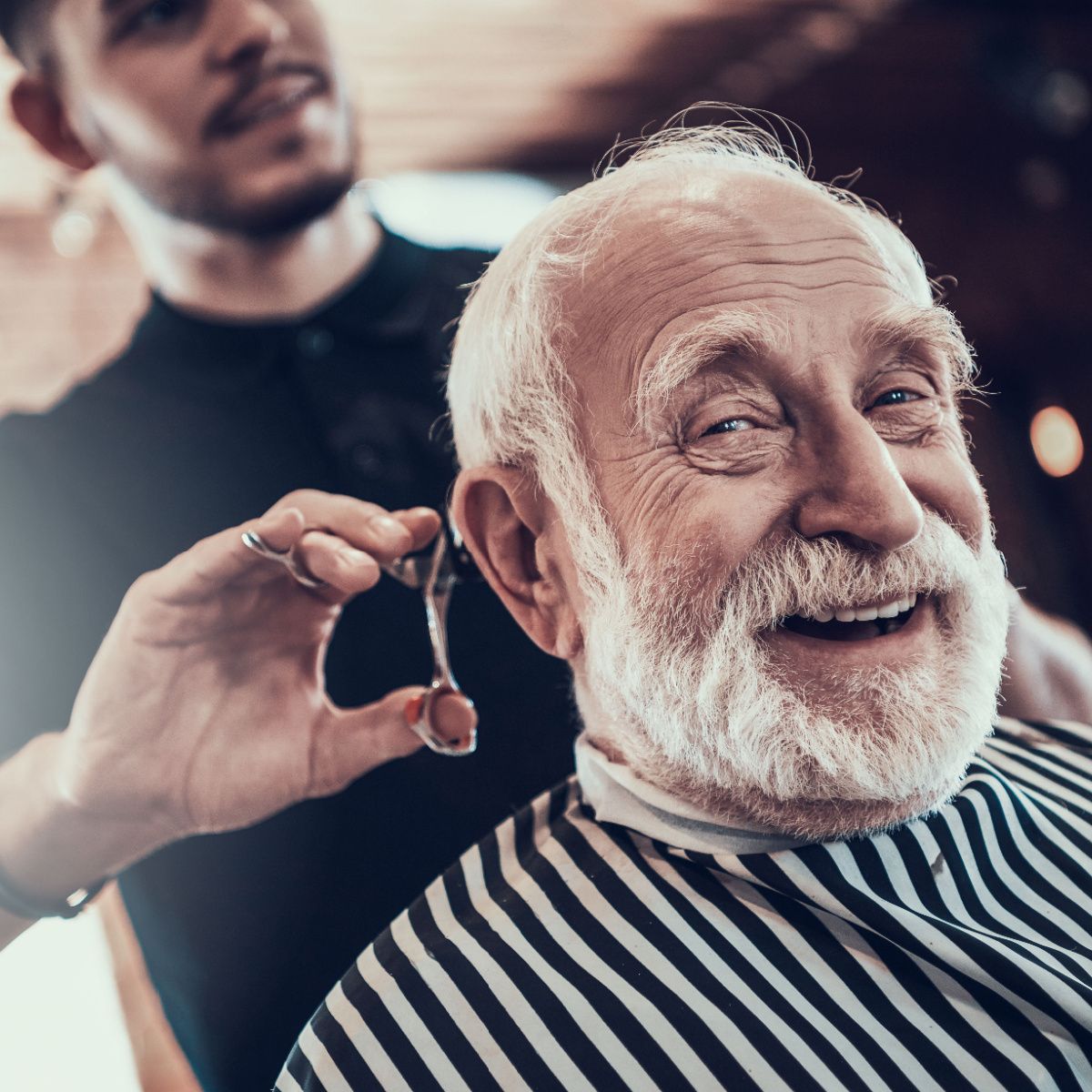 A caring Houston barber makes happy customers.